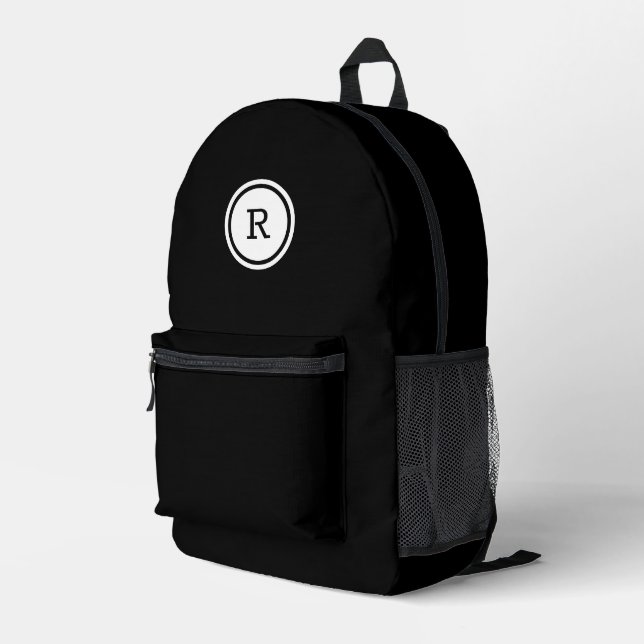 Bold Monogram in White Circle on Black Printed Backpack (Back Corner Right)