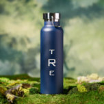 Bold Monogram on Blue Water Bottle<br><div class="desc">Bold minimal white vertical monogram on blue features a larger initial in the centre. Replace the 3 initials with your own in the sidebar.

Other water bottle colours and styles available in the sidebar.

Copyright © Claire E. Skinner. All rights reserved.</div>