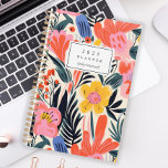 Bold Pink Yellow Floral Pattern Personalised 2025 Planner<br><div class="desc">Personalise this planner with your name in black italics framed by a white rectangle,  on a bold,  colourful pattern of pink,  yellow and orange flowers on a beige background.</div>