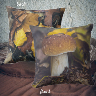 Bolete mushroom with yellow leaves cushion