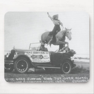 Bonnie Grey jumping her horse. Mouse Pad
