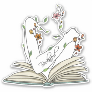 Book nerd delicate wild flowers forearm tattoo