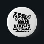 Book on Anti Gravity Funny Science Geek Puns 6 Cm Round Badge<br><div class="desc">I'm reading a book on anti gravity and it's impossible to put it down. Funny science pun design for those who love to study science. Cool and humourous quote merchandise for college students majoring in Physics. Perfect for scientist and physicist. Great Christmas gift and birthday present for family and friends....</div>