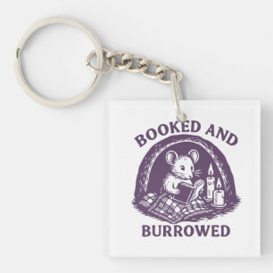 Booked and burrowed key ring