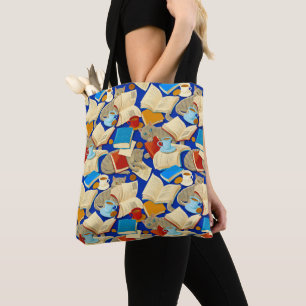 Books and cats on blue tote bag