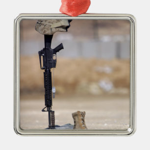 Boots, rifle, dog tags, and protective helmet metal ornament