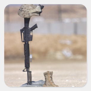 Boots, rifle, dog tags, and protective helmet square sticker