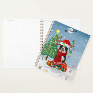 Border Collie dog in Snow with Christmas gifts Planner