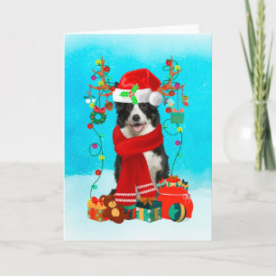 Border Collie in snow with Christmas gifts  Card
