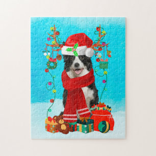 Border Collie in snow with Christmas gifts Jigsaw Puzzle