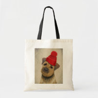 Border Terrier with Red Bobble Hat