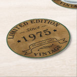 Born in 1975 vintage 50th birthday party round paper coaster<br><div class="desc">Add some originality with this limited edition,  premium-quality,  and unique vintage-looking birthday graphic design featuring cool typography. It's a great gift idea for men,  women,  husbands,  wives,  girlfriends,  and boyfriends who will appreciate this one-of-a-kind piece of art. A fun and memorable holiday gift for your birthday celebration.</div>