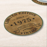 Born in 1975 vintage 50th birthday party round paper coaster<br><div class="desc">Add some originality with this limited edition,  premium-quality,  and unique vintage-looking birthday graphic design featuring cool typography. It's a great gift idea for men,  women,  husbands,  wives,  girlfriends,  and boyfriends who will appreciate this one-of-a-kind piece of art. A fun and memorable holiday gift for your birthday celebration.</div>