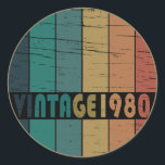 Born in 1980 vintage birthday classic round sticker<br><div class="desc">You can add some originality to your wardrobe with this original 1980 vintage sunset retro-looking birthday design with awesome colours and typography font lettering, is a great gift idea for men, women, husband, wife girlfriend, and a boyfriend who will love this one-of-a-kind artwork. The best and most fun holiday present...</div>
