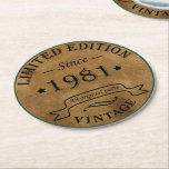Born in 1981 vintage birthday round paper coaster<br><div class="desc">You can add some originality to your wardrobe collection with this vintage classic birthday graphic design with awesome typography font lettering; It is a great gift for men, women, husbands, wife, girlfriend, and boyfriend who will love this one-of-a-kind artwork. The best and most fun holiday present for your happy birthday...</div>