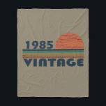 born in 1985 vintage 40th birthday gift fleece blanket<br><div class="desc">This vintage classic graphic design with awesome typography font lettering can add originality to your wardrobe collection. It is a great gift idea for men, women, husbands, wives, girlfriends, and boyfriends who will love this one-of-a-kind artwork. It is the best and most funny holiday present for your happy birthday party....</div>
