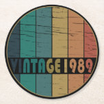 Born in 1989 vintage birthday gift round paper coaster<br><div class="desc">You can add some originality to your wardrobe with this original 1989 vintage sunset retro-looking birthday design with awesome colours and typography font lettering, is a great gift idea for men, women, husband, wife girlfriend, and a boyfriend who will love this one-of-a-kind artwork. The best and most fun holiday present...</div>