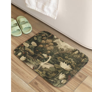 Botanical scene of a white swan in a forest river bath mat