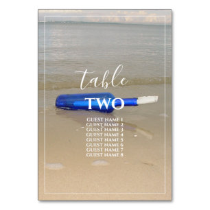 Bottle On Beach Sand Wedding Guest Names Table Number