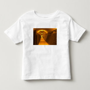 Bottles aging either in pupitres (racks) waiting toddler T-Shirt
