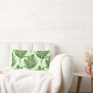 Bouquet of lilly of the valley flowers on green lumbar cushion