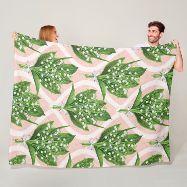 Bouquet of lilly of the valley flowers on pink fleece blanket (In Situ)