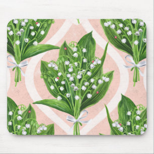 Bouquet of lilly of the valley flowers on pink mouse pad