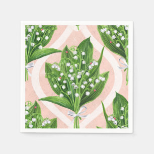 Bouquet of lilly of the valley flowers on pink napkin