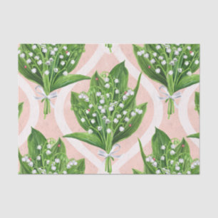 Bouquet of lilly of the valley flowers on pink tissue paper