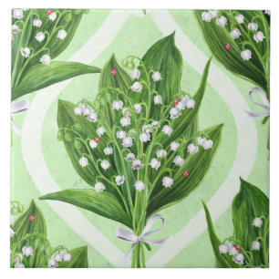 Bouquet of lily of the valley flowers on blue ceramic tile