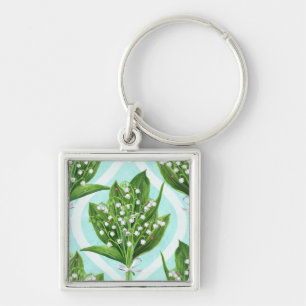 Bouquet of lily of the valley flowers on blue key ring