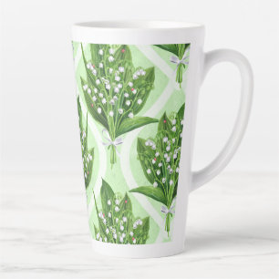 Bouquet of lily of the valley flowers on blue latte mug