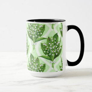 Bouquet of lily of the valley flowers on blue mug