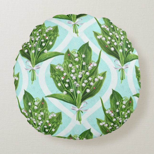 Bouquet of lily of the valley flowers on blue round cushion (Front)