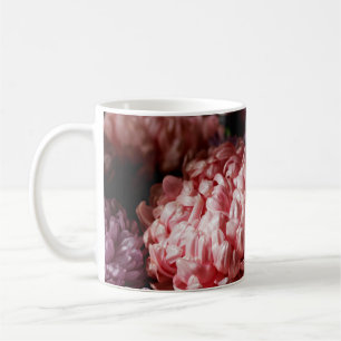 Bouquet of pink with purple aster flowers in light coffee mug