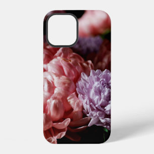 Bouquet of pink with purple aster flowers in light iPhone 12 case