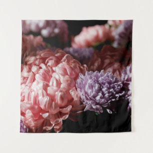 Bouquet of pink with purple aster flowers in light tapestry