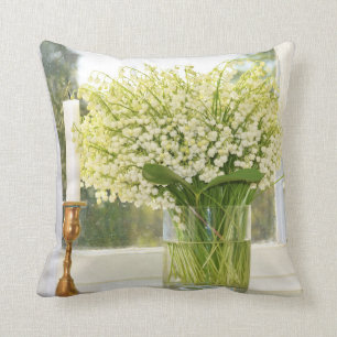 Bouquet of spring flowers lilies of the valley cushion