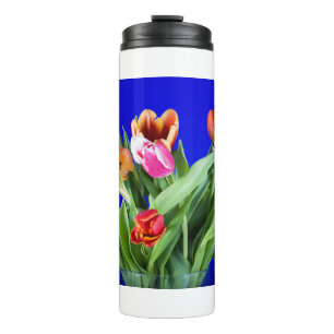 Bouquet of tulips on blue thermal tumbler