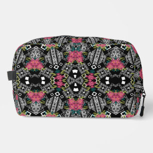 Bouquets of pink flowers flowers on a geometric dopp kit