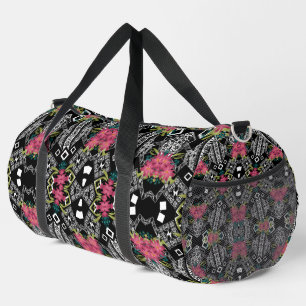 Bouquets of pink flowers flowers on a geometric duffle bag