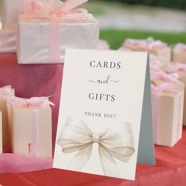 Bow beige cream cards gifts sign (Creator Uploaded)