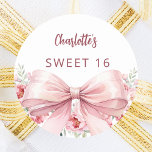 Bow blush pink florals Sweet 16 Classic Round Sticker<br><div class="desc">A white coloured background. Decorated with a large pink bow and pink flowers.  Personalise and add a name. Black handwritten style script.</div>