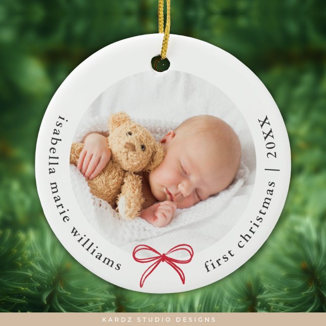 Bow Photo Modern Baby First Christmas Ceramic Ornament (Circle ceramic ornament shown, personalize and choose ceramic or metal.)