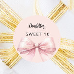 Bow pink Sweet 16 Classic Round Sticker<br><div class="desc">A blush pink coloured background. Decorated with a large bow.  Personalise and add a name. Black handwritten style script.</div>