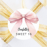 Bow pink white Sweet 16 Classic Round Sticker<br><div class="desc">A white coloured background. Decorated with a large pink bow.  Personalise and add a name. Black handwritten style script.</div>