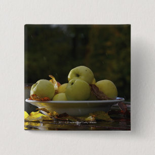 Bowl of apples and leaves 15 cm square badge