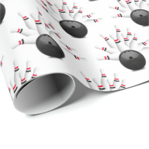bowling ball and pins on white wrapping paper