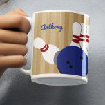 Bowling Ball and Pins Personalised Coffee Mug<br><div class="desc">Create a personalised gift for your favourite bowler when you add their name to this coffee mug. Realistic style illustrations of bowling pins and blue bowling ball are set against a tan striped background with a spot to add a name in blue script lettering. The name and graphic appear on...</div>