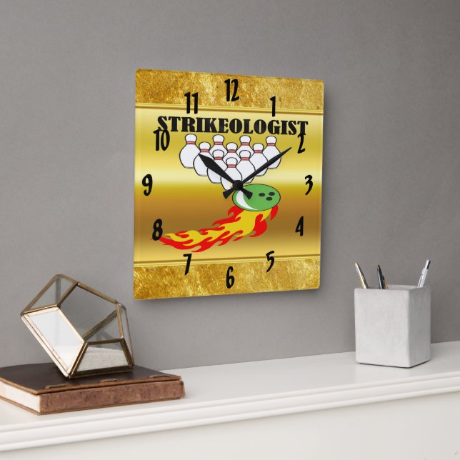 Bowling pins and ball with the word STRIKEOLOGIST Square Wall Clock (Office)